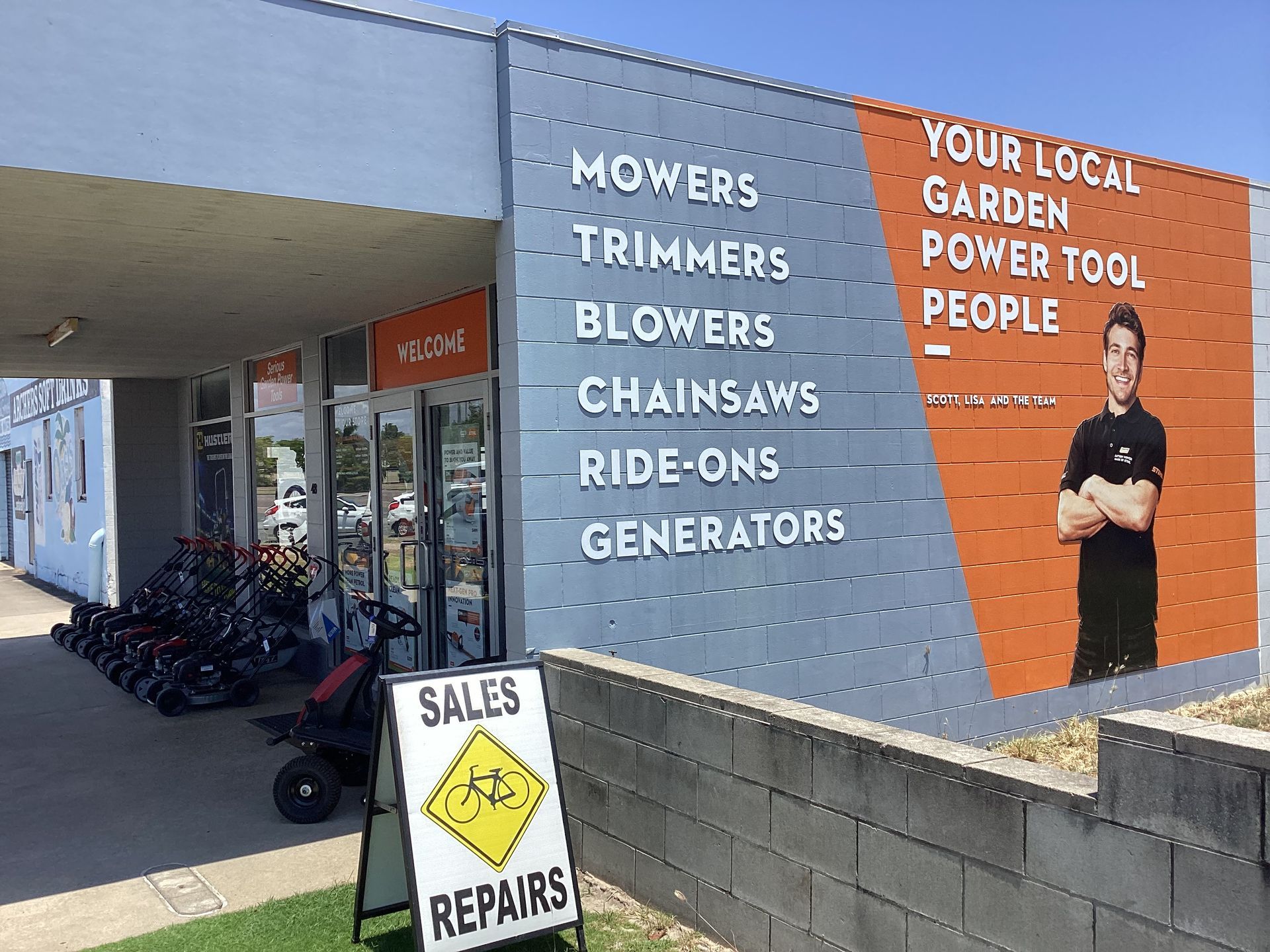 Sales and repairs sign outside our Bowen small engine repairs workshop