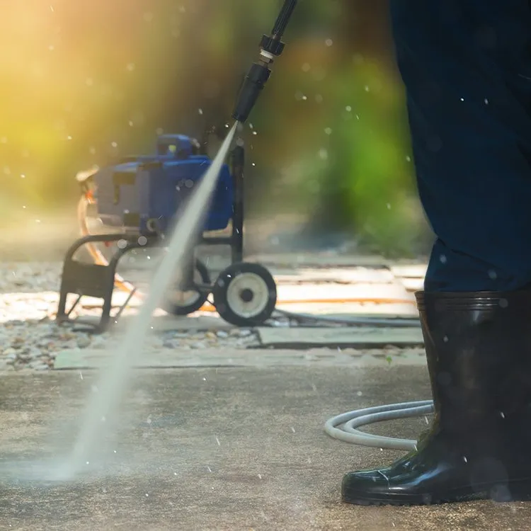 Pressure washer cleaning equipment in use, available in Bowen