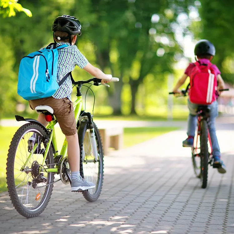 Children riding push bikes, kids' bikes available in Bowen